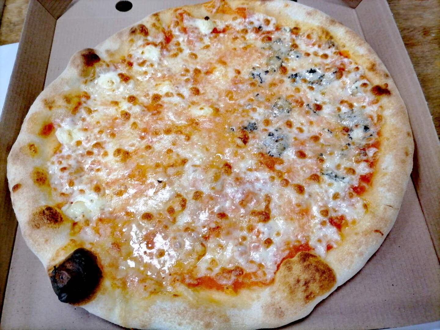 Spicy pepperoni pizza with honey drizzle